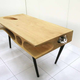 Image for article titled This Sleek Table Is Hiding a Playground For Cats